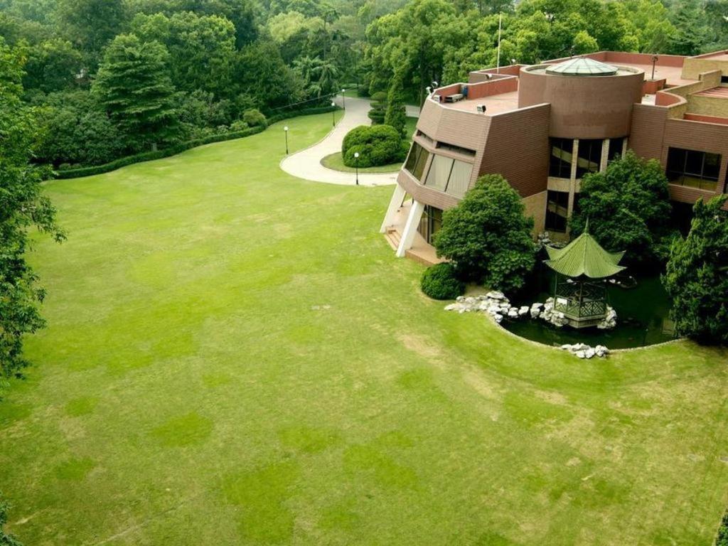 Cypress Hotel Jin Jiang Шанхай Экстерьер фото